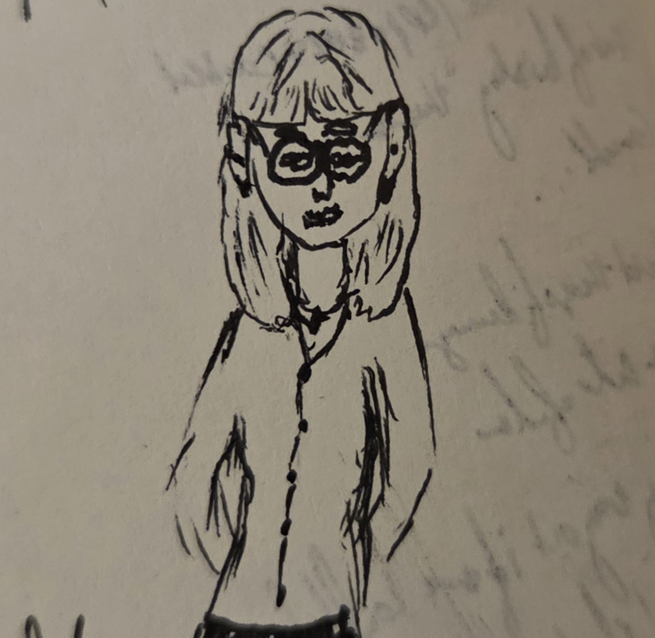 a self portrait doodled in my moleskin